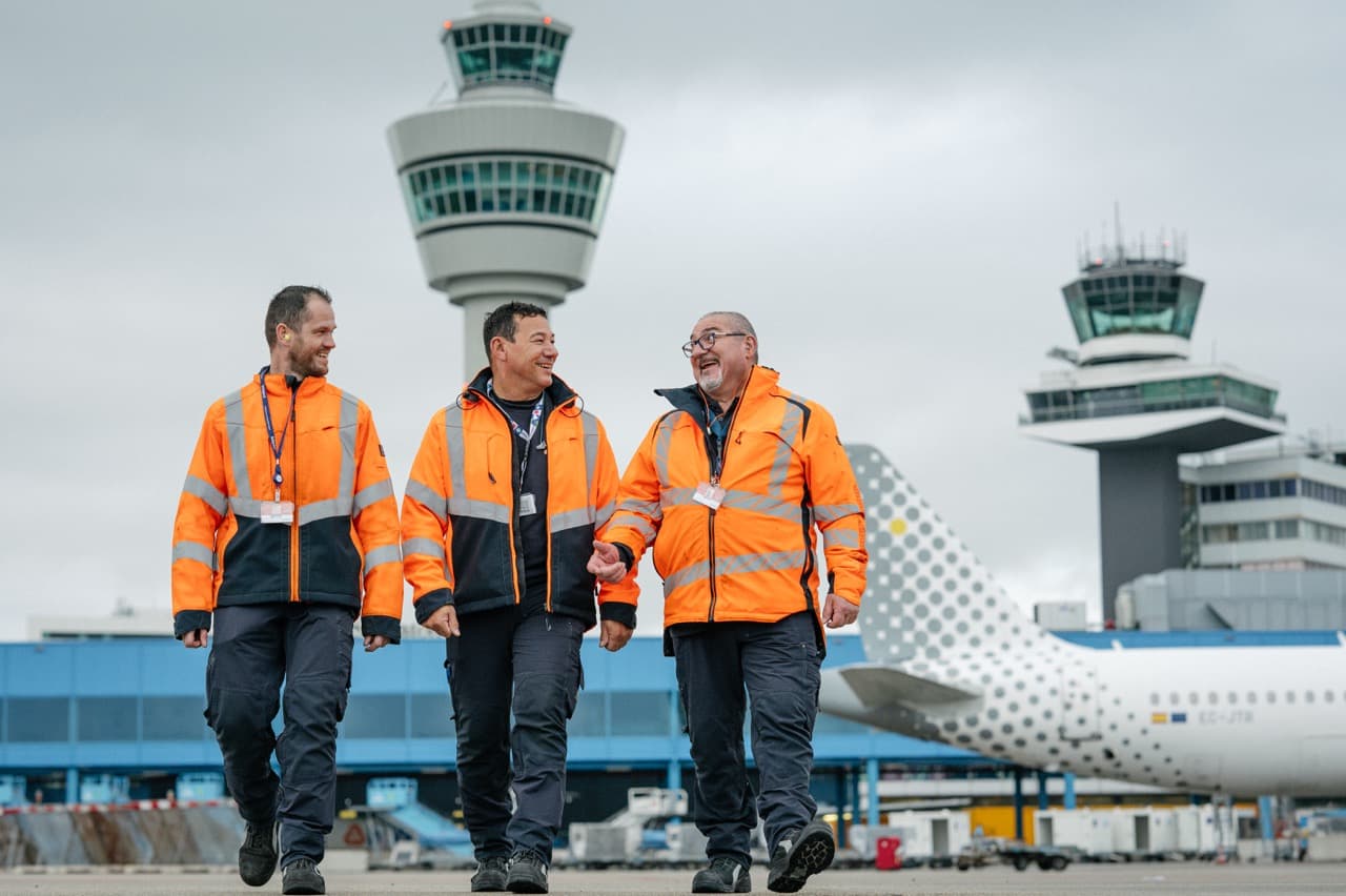 Ramp employees walking on apron